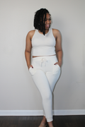 off white French Terry fabric joggers with pockets and drawstring closure and ribbed racerback tank set