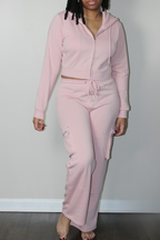 baby pink cargo flared sweatpants and full zip cropped hoodie with drawstring closures 